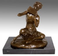 Art Deco Bronze Faun / Satyr/ sitting Devil plays a panpipe.