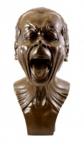 Bronze head with a stretched out tongue - F. X. Messerschmidt
